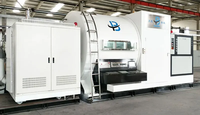 Close-up of evaporation chamber in aluminum-paper vacuum metallizer machine