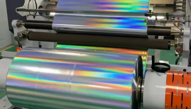 Holographic film slitter rewinder